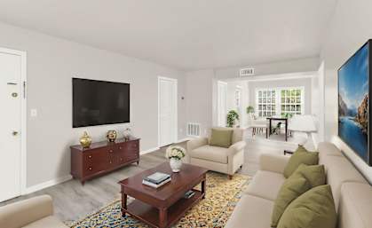a living room with a couch and a coffee table