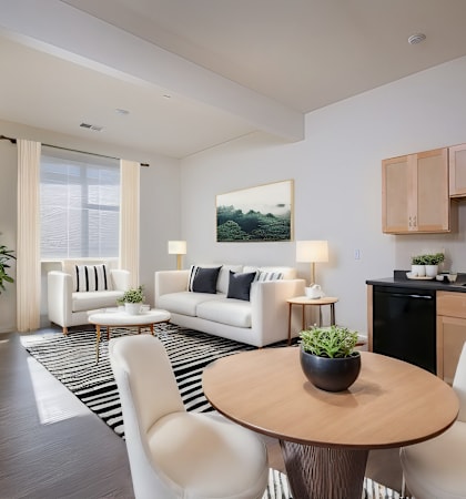 Cornerstone Village apartment interior of kitchen and living room virtually staged with furniture.