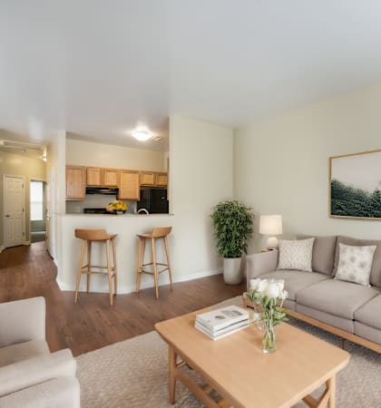 a living room with a couch and a table