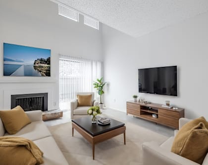 a living room with a couch and a coffee table