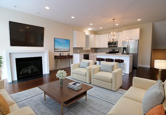 a living room with a couch and a table