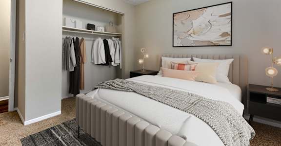 a bedroom with a large bed and a closet with a mirrored door