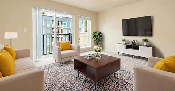 a living room with couches a coffee table and a television