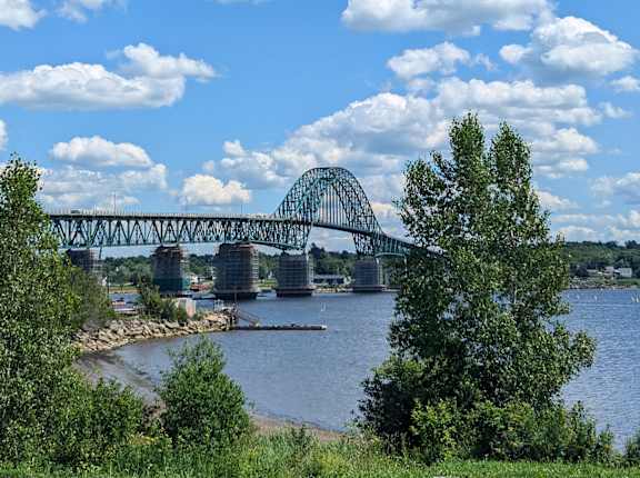 a view of a bridge over a body of water