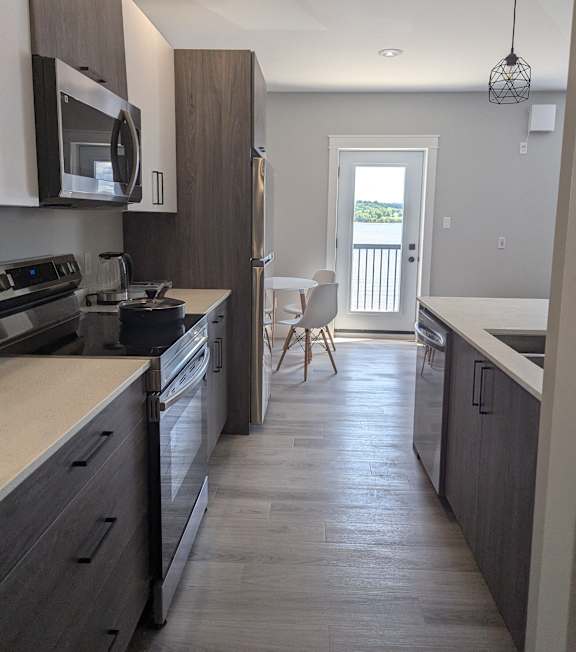 a kitchen with a large island in the middle