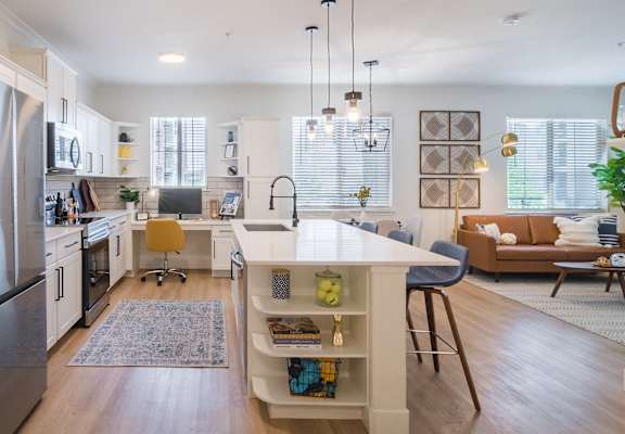 a kitchen and living room at Terracina, Broomfield, 80020