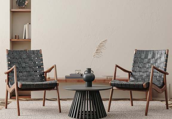 two chairs around a small coffee table