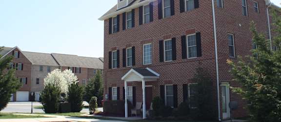 3 story brick building with front stoop  at Rosewood Village, Hagerstown, 21742