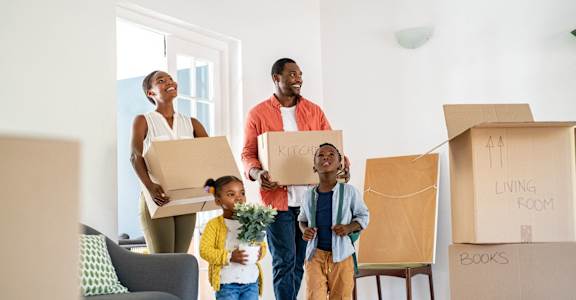 A family of four is moving into a new home.