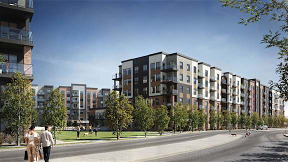 Corner view of Douglas Place apartments showcasing contemporary architecture in Calgary