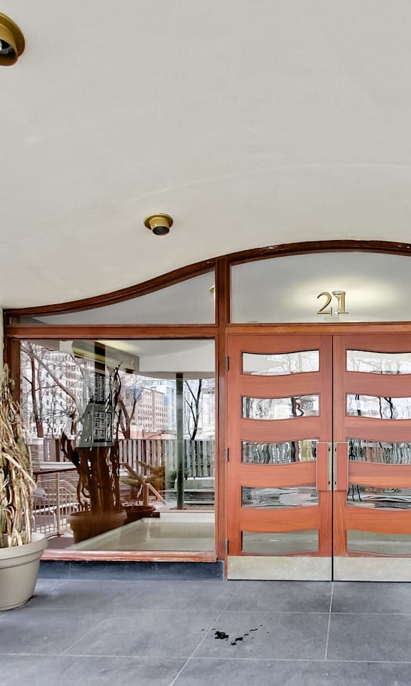 A large wooden door with the number 21 on it.