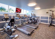 Thumbnail 13 of 24 - Getting a cardio workout is no sweat with treadmills, ellipticals and stationary bikes in the fitness center.