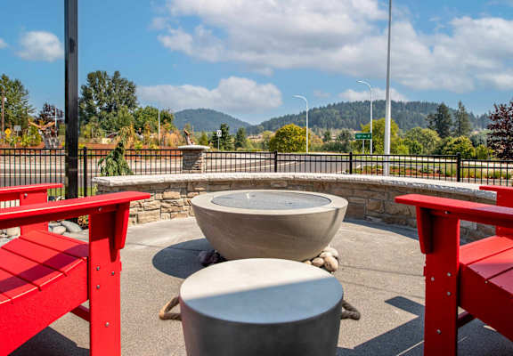 Outdoor with patio with red chairs at Scouter's Mountain, Happy Valley, OR