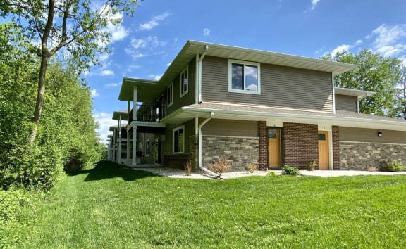 a large house with a garage in front of it