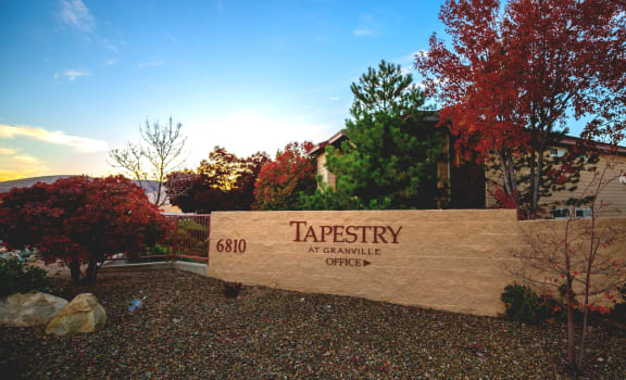 a sign at the entrance of tapestry