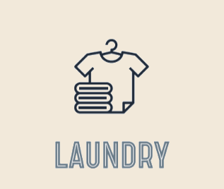 a shirt hanging on a hanger with a shirt on a clothes rack with laundry