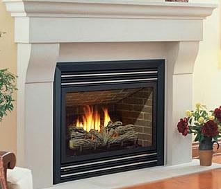 Fireplace with white frame and a vase on the floor