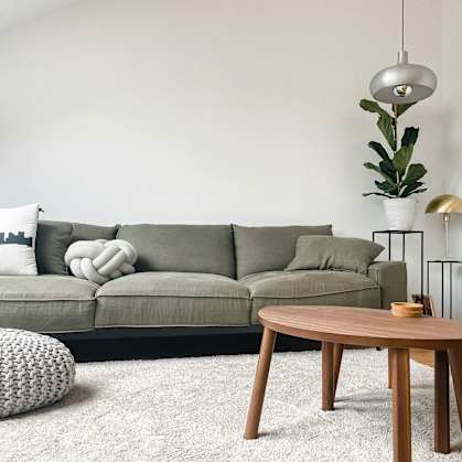 a living room with a couch and a coffee table