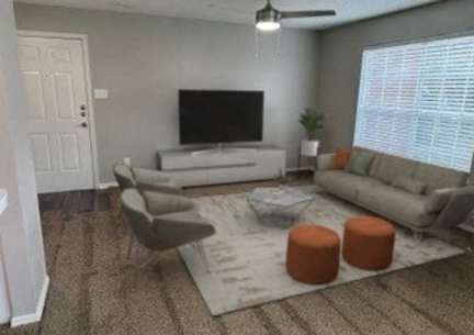 a dining area with a table and chairs and a kitchen at Paces Crossing, Denton, 76210