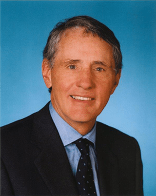 a portrait of a man in a suit and tie