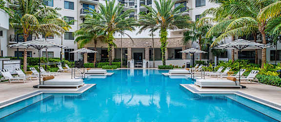Resort-style swimming pool - The Remy Apartments