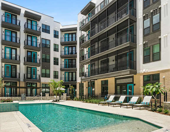 Axio at Carillon - Resort-style swimming pool with sundeck