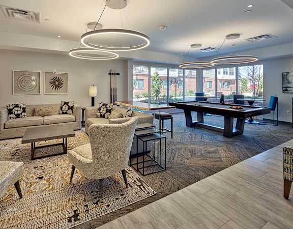 Lansdale Station Apartments indoor seating area and billiards table