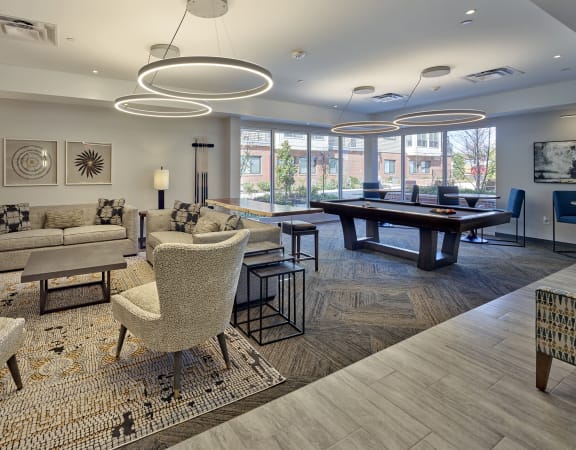 Lansdale Station Apartments indoor seating area and billiards table