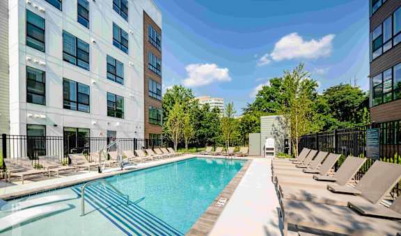 our apartments have a large pool and lounge chairs