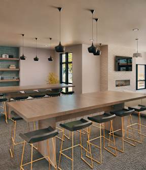 A modern apartment complex with a mix of blue and beige colors.