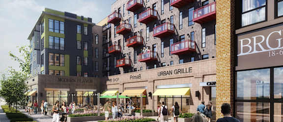A street view of a modern urban grille with people walking around.