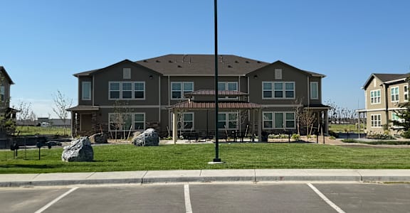 a large house with a street light in front of it