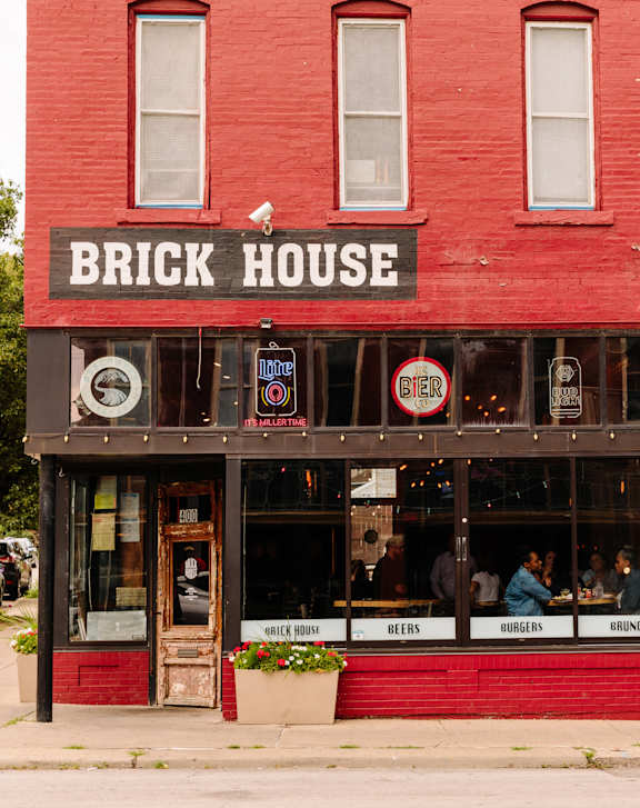 A red building with the name Brick House on it.