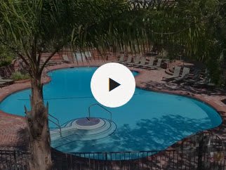 an aerial view of a large swimming pool at The Meadows Apartments, Culver City , CA 90230