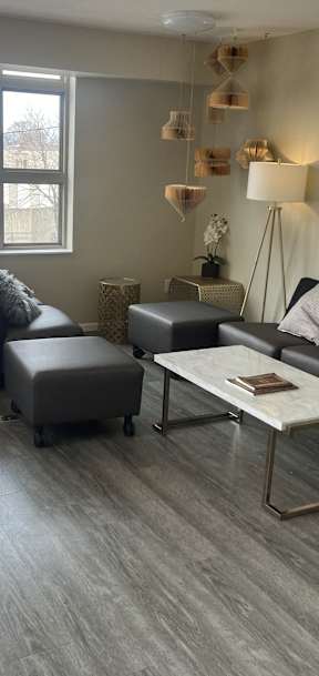 a living room with couches and a coffee table