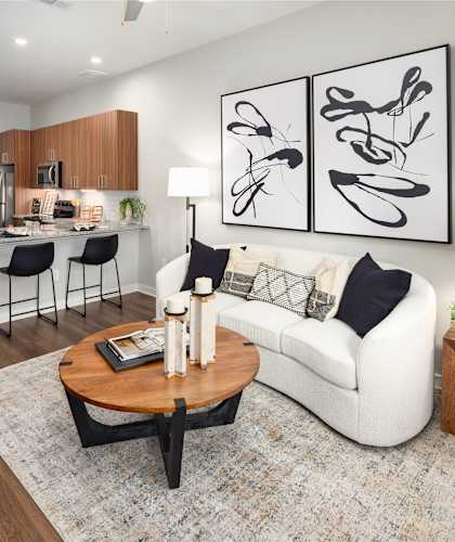 a living room with a couch and a table