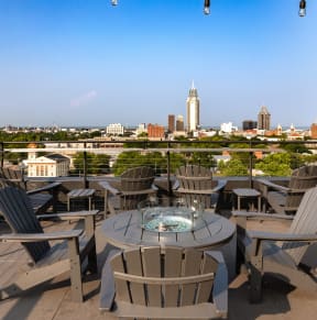 a view of the city from the rooftop terrace