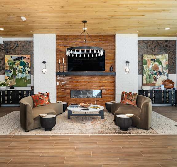 A living room with a fireplace and a couch.