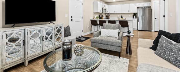 a living room with a couch and a table