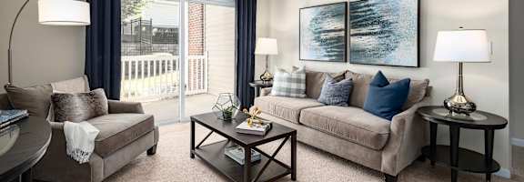 Living Room With Balcony at Abberly Green Apartment Homes, North Carolina, 28117