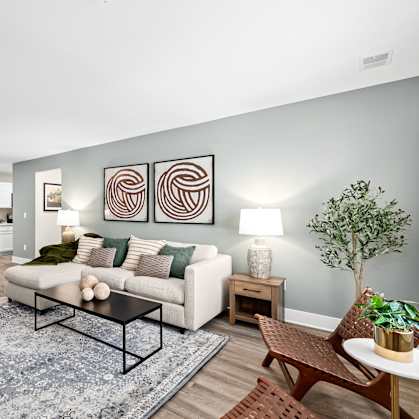 a living room with a couch and a coffee table