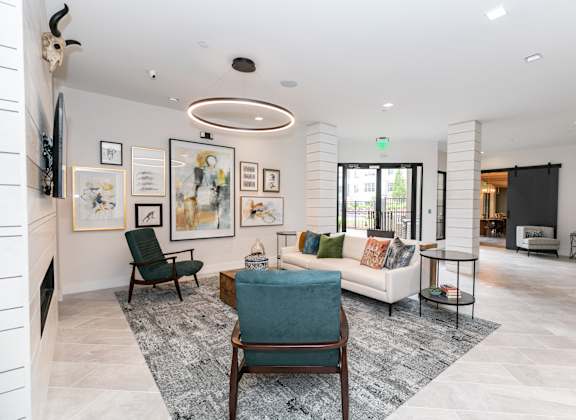 a living room filled with furniture and a fire place