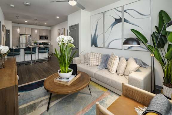 a living room with a couch and a table