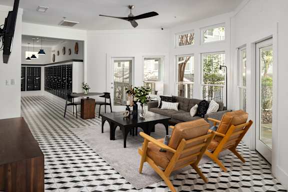 A black and white checkered floor in a living room.