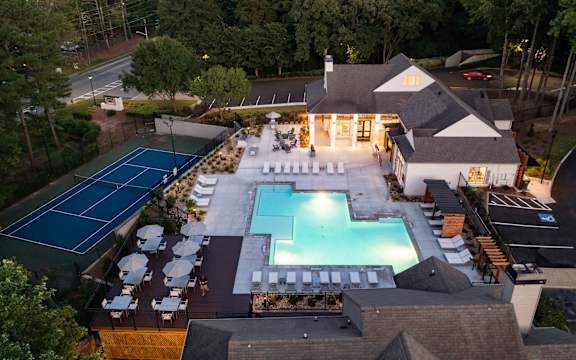 arial view of the club house and pool at night