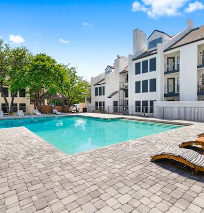 our apartments offer a swimming pool with chaise lounge chairs
