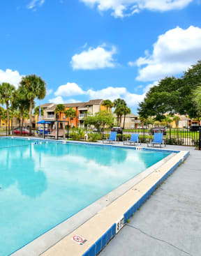 take a dip in the resort style pool at Village Park, Florida
