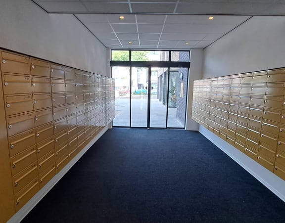 a row of lockers in a hallway in a building