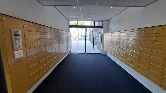 a row of lockers in a hallway in a building