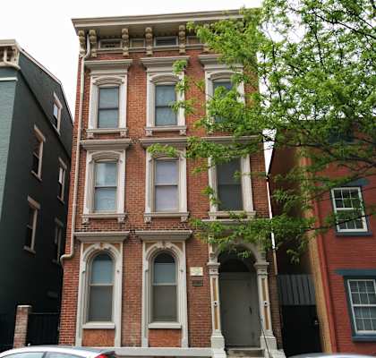 a red brick building on a city street
